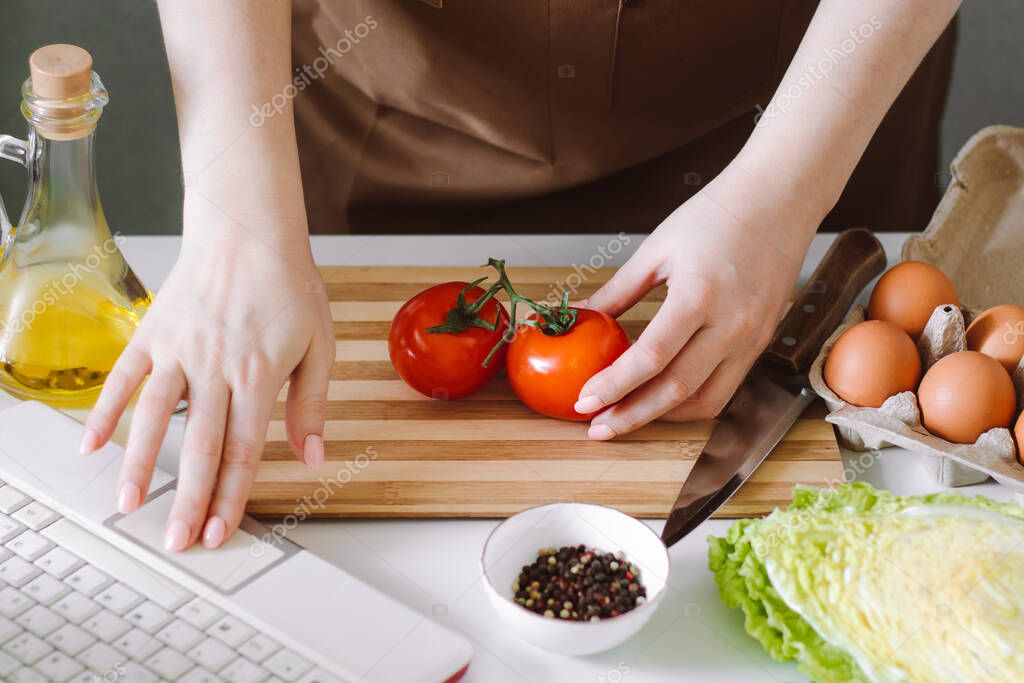 Nutrition educator taking an online course on a laptop